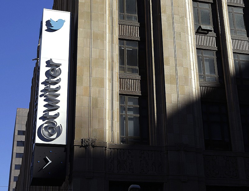 
              FILE - This Nov. 4, 2013, file photo shows the sign outside of Twitter headquarters in San Francisco. Twitter announced Wednesday, March 1, 2017, it is adding more new tools to curb abuse, part of an ongoing effort to protect its users from hate and harassment. It the second time in three weeks the company has released new features aimed at rooting out abusive content, signaling that it’s getting more serious about the issue after being criticized for not doing enough in the decade since its founding. (AP Photo/Jeff Chiu, File)
            