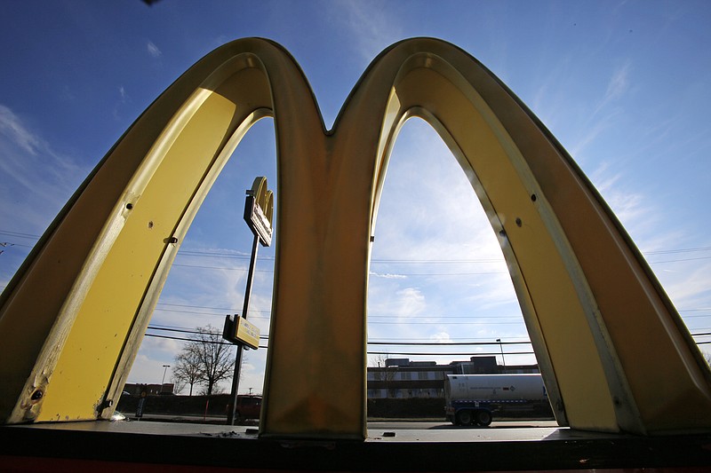 
              This Wednesday, Feb. 22, 2017, photo, shows the golden arches at sunset at a McDonald's restaurant in Robinson Township, Pa. McDonald’s Corp. says it will launch mobile order-and-pay and curbside pickup in the U.S. toward the end of 2017. (AP Photo/Gene J. Puskar)
            