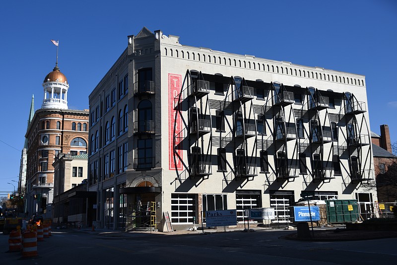 The Tomorrow building includes 39 micro-unit apartments above a new restaurant, movie house, coffee shop and juice bar scheduled to open by this summer.