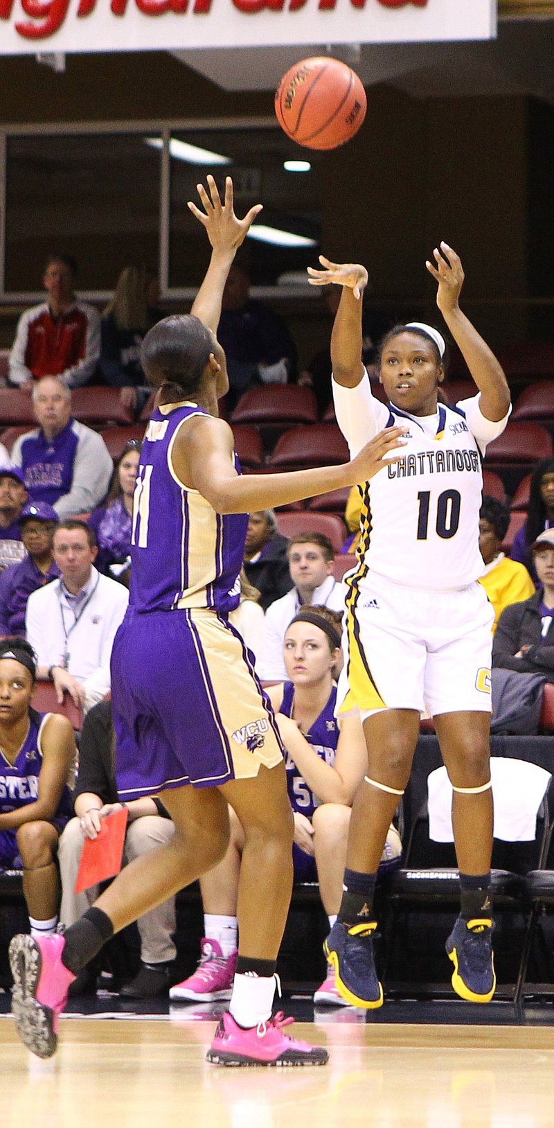 UTC Photos from Dale Rutemeyer UTC's Queen Alford shoots a 3-pointer during the Mocs' 85-41 win over Western Carolina in the first round of the SoCon tournament. Alford finished with eight points.