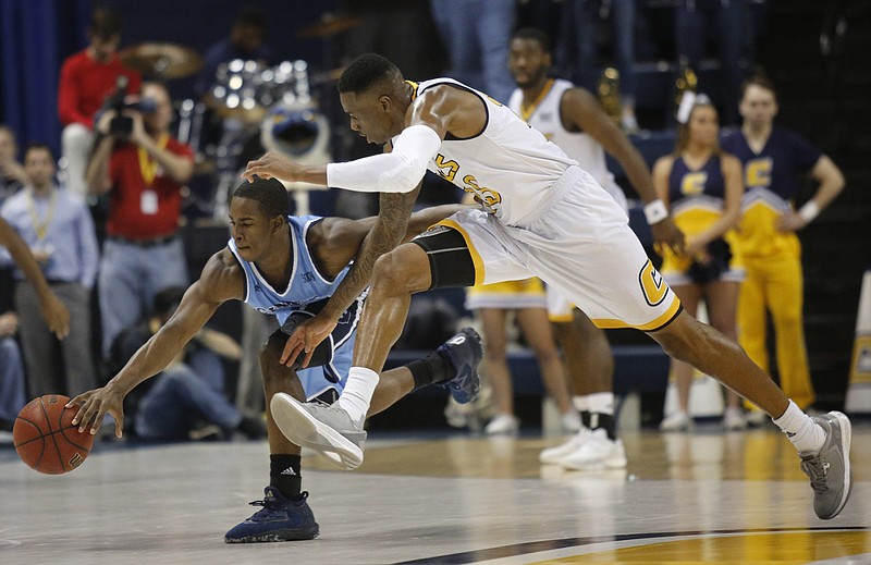 UTC forward Tre McLean, right, keeps pace with Citadel guard Quayson Williams during the Mocs' home basketball game against The Citadel at McKenzie Arena on Wednesday, Jan. 11, 2017, in Chattanooga, Tenn.