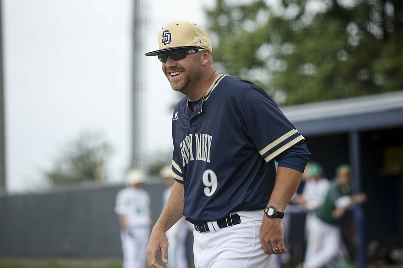 Soddy-Daisy baseball coach Jared Hensley laughs after the home plate conference during their prep baseball game against Rhea County at Soddy-Daisy High School on Thursday, April 21, 2016, in Soddy-Daisy, Tenn.