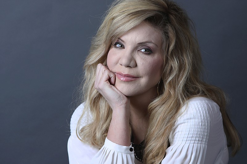 
              In this Feb. 23, 2017 photo, Grammy Award-winning artist Alison Krauss poses for a portrait in New York to promote her solo album, "Windy City." (Photo by Amy Sussman/Invision/AP)
            