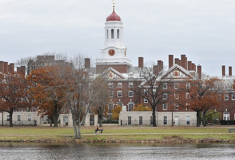 
              FILE - This Nov. 13, 2008 file photo shows the campus of Harvard University in Cambridge, Mass. Harvard University is taking new steps to confront its past ties to slavery. The Ivy League school is hosting a conference Friday, March 3, 2017, exploring the historical ties between slavery and early universities, including Harvard. (AP Photo/Lisa Poole, File)
            