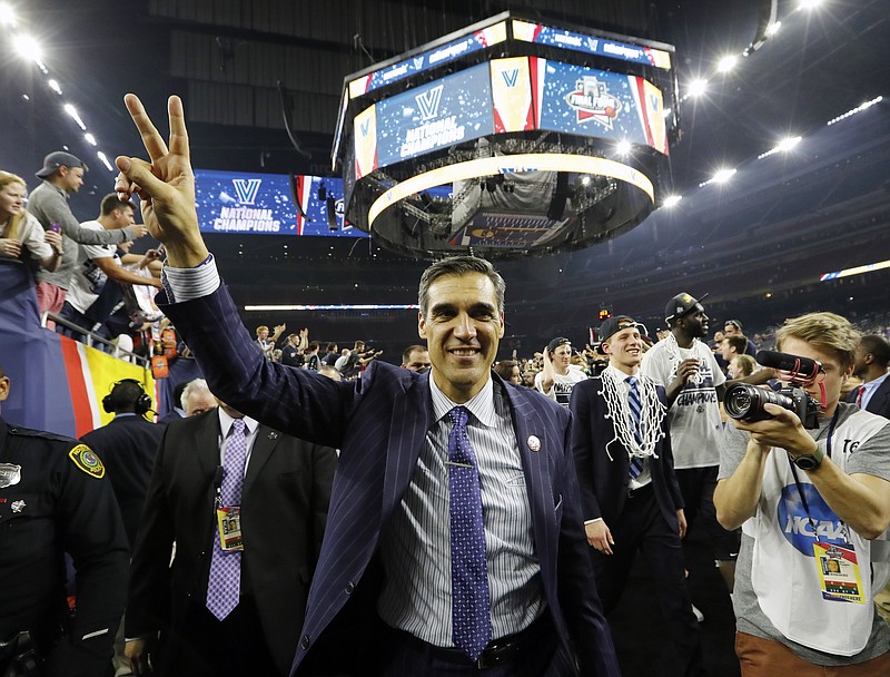 
              FILE - In this April 4, 2016, file photo, Villanova head coach Jay Wright celebrates after the NCAA Final Four tournament college basketball championship game against North Carolina, in Houston. Jay Wright recounts Villanova's national championship run in his new book, "Attitude."  (AP Photo/David J. Phillip, File)
            