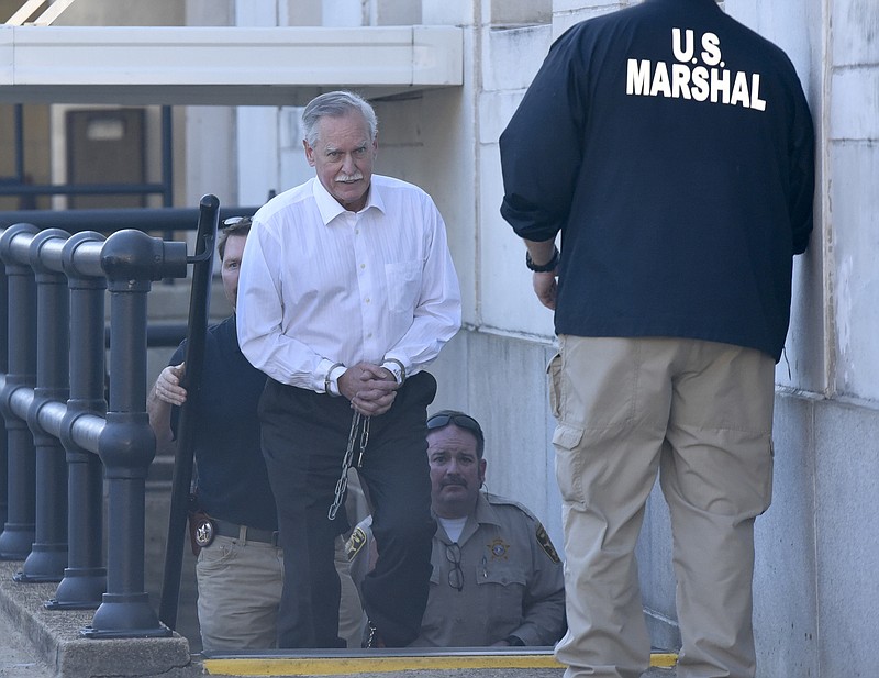 Former Tennessee Valley Authority engineer Robert Doggart is escorted from the Joel W. Solomon Federal Building in Chattanooga on Feb. 16, 2017, after his four count conviction of planning an attack on a Muslim community.