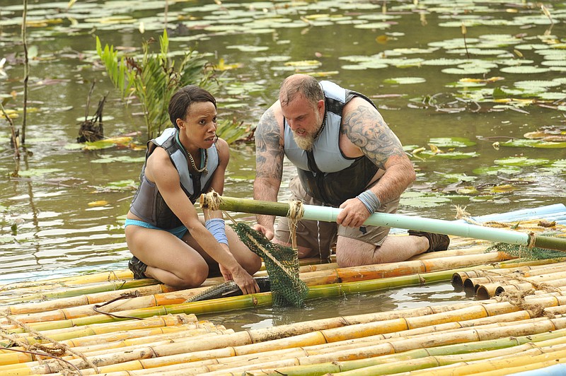 Nakeisha Turk and her partner, Delta Force Sgt. Maj. John McPhee, build a raft in the premiere episode of Fox's new reality show, "Kicking and Screaming." (Jeff Neira/Fox)