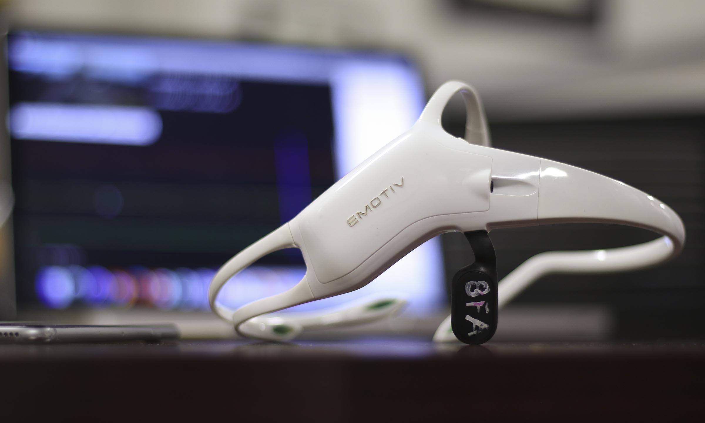 Staff Photo by Dan Henry / The Chattanooga Times Free Press- 2/23/17. Alex Cruikshank and Dr. Andrew Bailey speak about a brain-monitoring program that are using EMOTIV headsets to livestream athletes brainwaves.