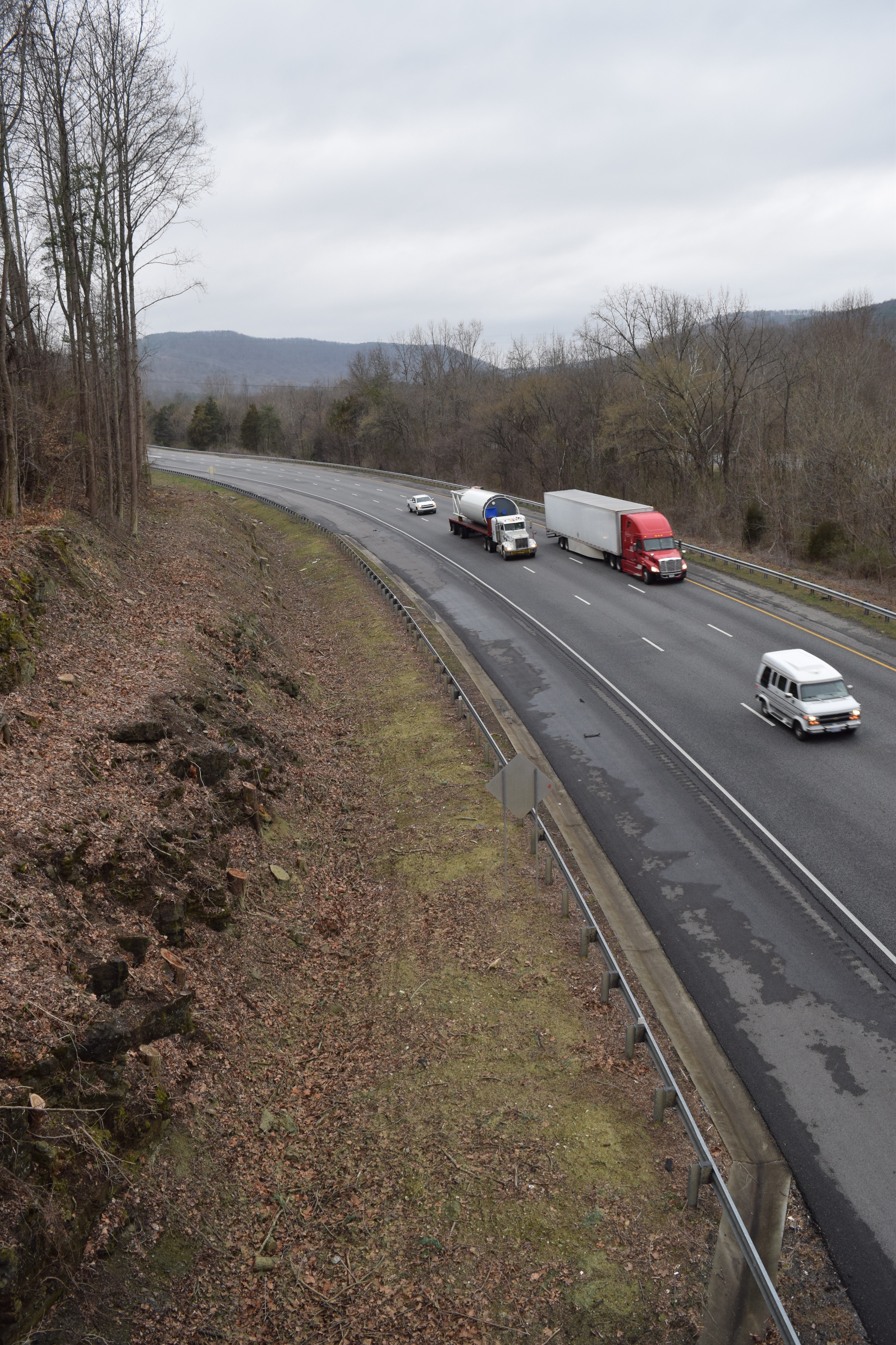 Georgia Department of Transportation crews have trimmed back the tree line on Intestate 24, west of Chattanooga where it runs through the Peach State for four miles along the Tennessee border. GDOT crews also are doing similar work on Interstate 59. The work is intended to enhance safety to improve driver visibility and response time. Here, tree stumps extend down almost to the drainage ditch, showing where the tree line was previously.