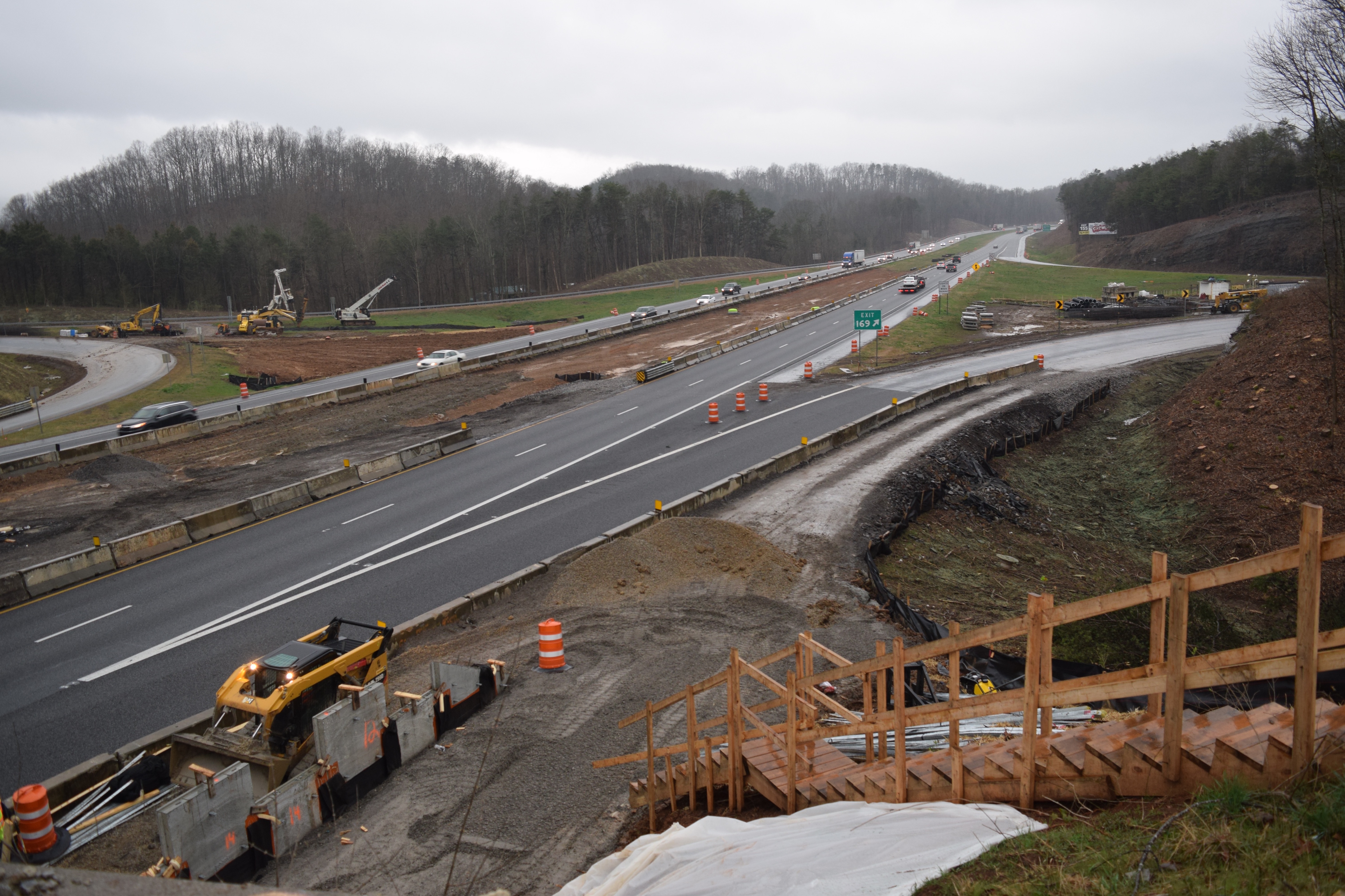Georgia Department of Transportation crews have trimmed back the tree line on Intestate 24, west of Chattanooga where it runs through the Peach State for four miles along the Tennessee border. Here, GDOT crews work on the new bridge project at Georgia Highway 299 where the treeline work begins along the interstate, seen to the extreme right and in the distance. The work is intended to enhance safety to improve driver visibility and response time.