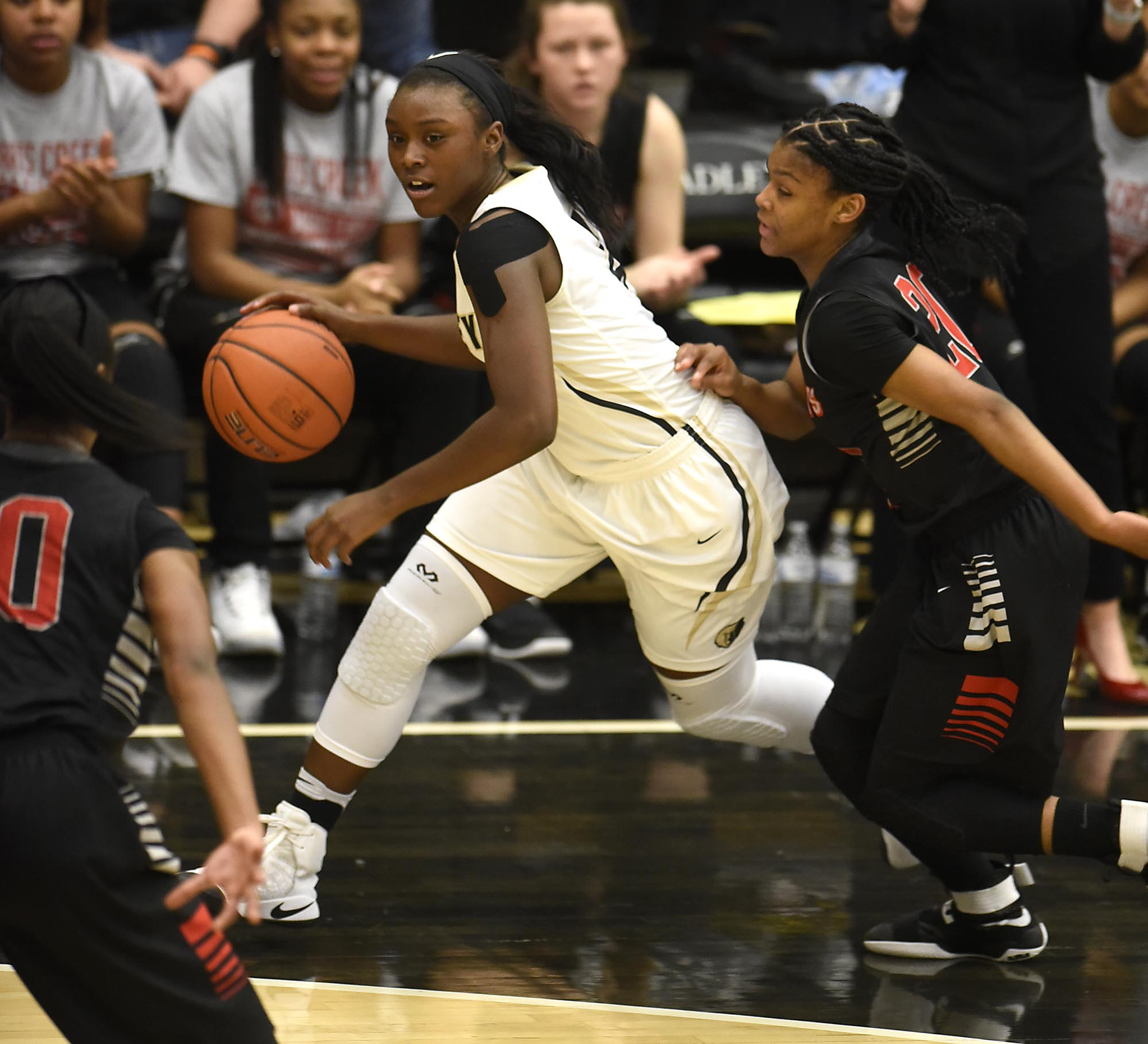 Bradley's Kimia Carter (4) dribbles and looks for a open teammate. The Stewarts Creek Red Hawks visited the Bradley Central Bears in TSSAA girls sub state basketball action on March 4, 2017.