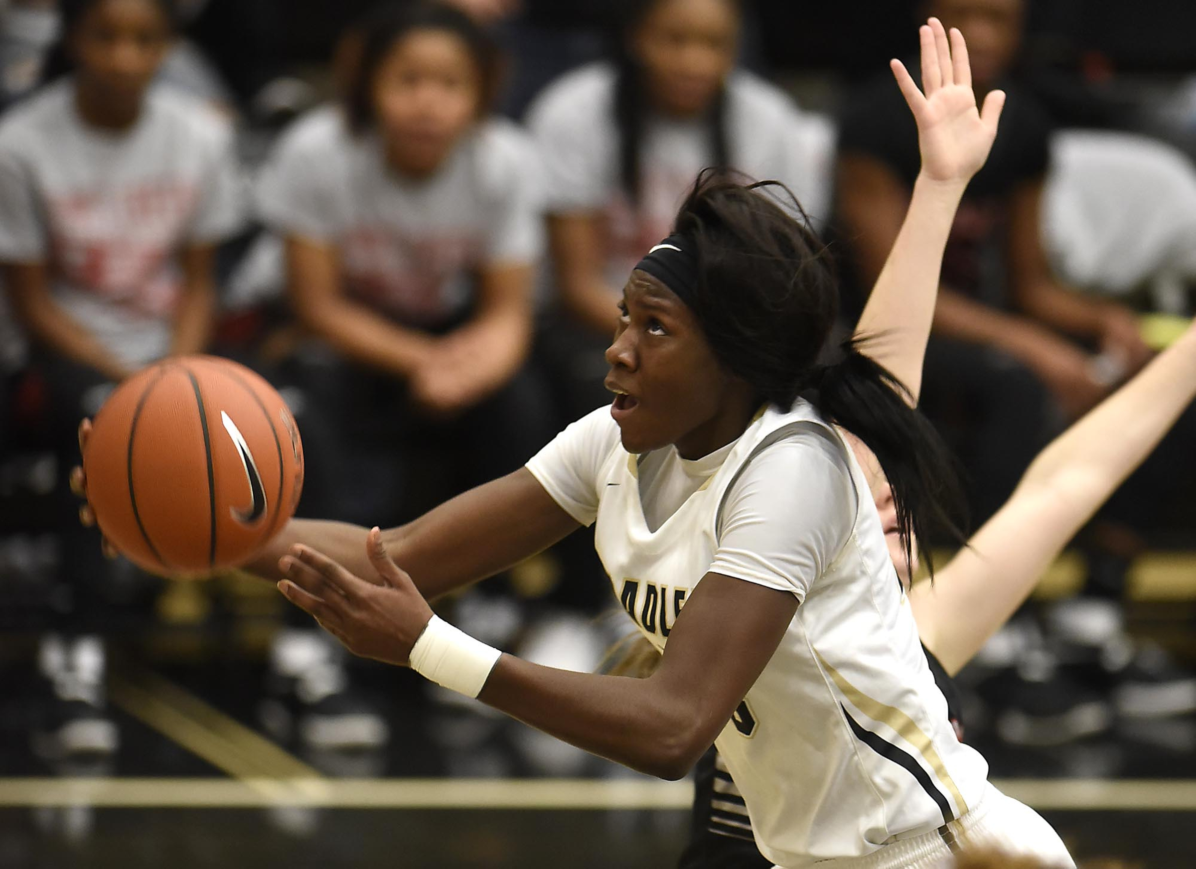 Bradley's Rhyne Howard (23) lays a shot up in traffic. The Stewarts Creek Red Hawks visited the Bradley Central Bears in TSSAA girls sub state basketball action on March 4, 2017.