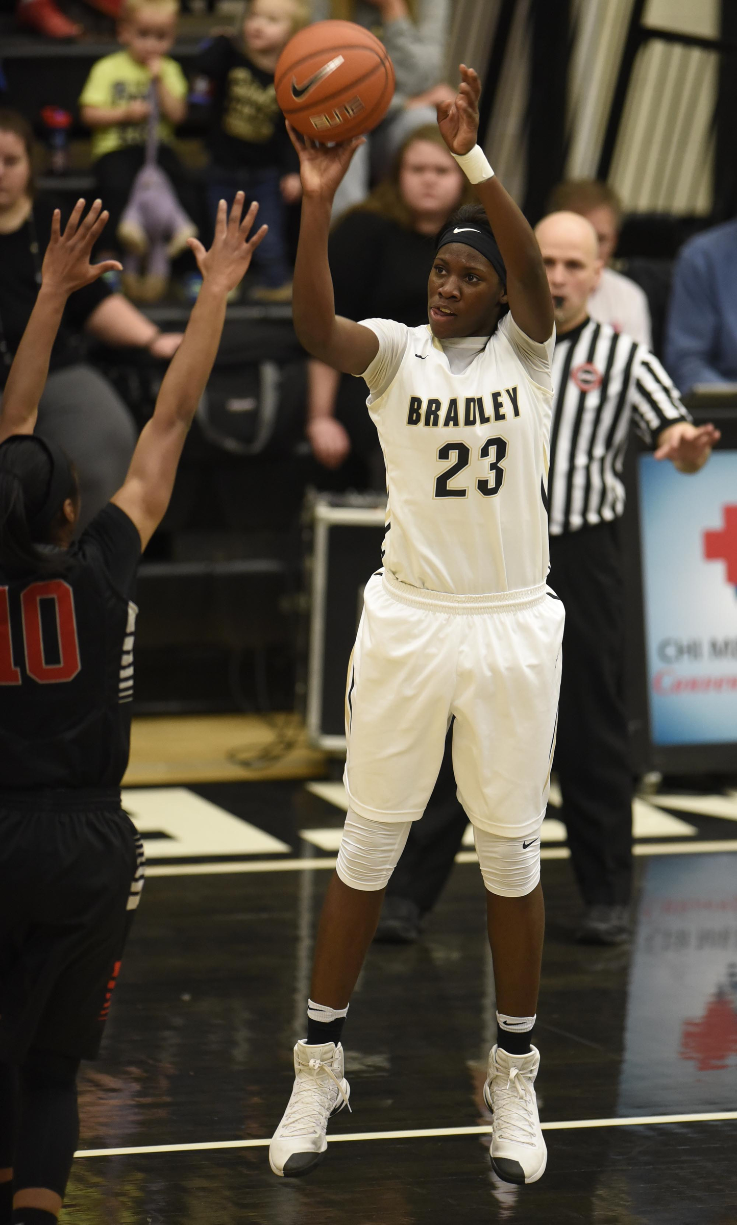Bradley's Rhyne Howard (23) lthrows a up a three-point shot. The Stewarts Creek Red Hawks visited the Bradley Central Bears in TSSAA girls sub state basketball action on March 4, 2017.
