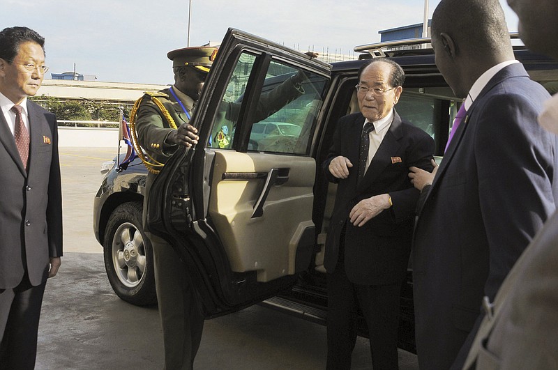 
              FILE -- In this file photo taken Thursday, Oct. 30, 2014, North Korea's ceremonial leader Kim Yong Nam, center-right, the head of North Korea's parliament, arrives for a visit to Uganda's parliament in Kampala, Uganda. North Korean weapons barred by U.N. sanctions ended up in the hands of U.N. peacekeepers in Africa, a confidential report says. That incident and others in more than a half-dozen African nations show how North Korea, despite facing its toughest sanctions in decades, continues to avoid them on the world's most impoverished continent with few repercussions. (AP Photo, File)
            