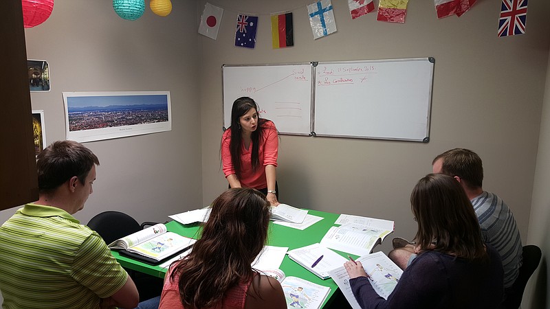 One of Chattanooga School of Language's adult French classes reviews their notes.