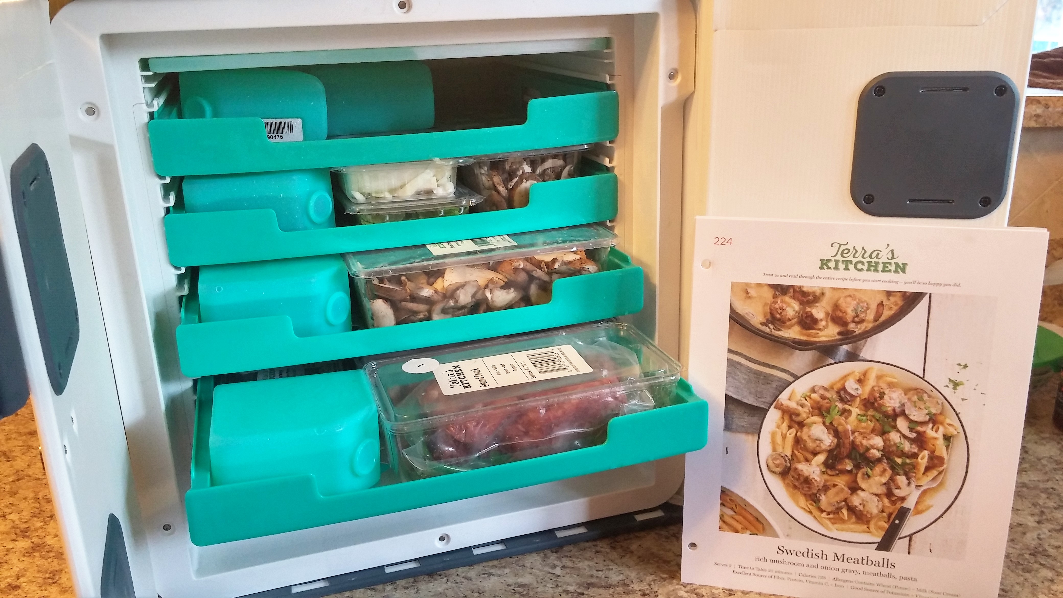 Meals from Terra's Kitchen come packed in a small, refrigerator-like container. Place all the ingredients in your home refrigerator, then put the package back on your porch. It will be picked up and returned to the company the next business day.