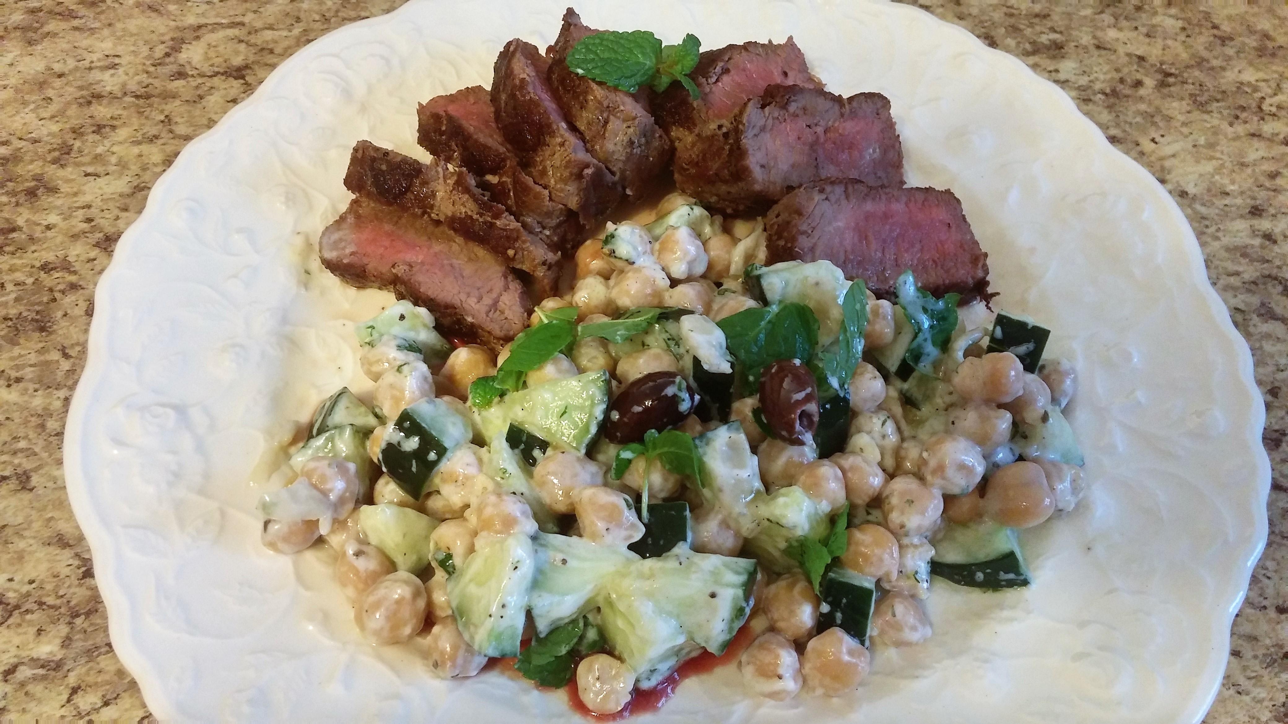 Lamb with Creamy Cucumber-Feta Salad from Terra's Kitchen is an impressive meal to prepare that takes just minutes to assemble and cook.