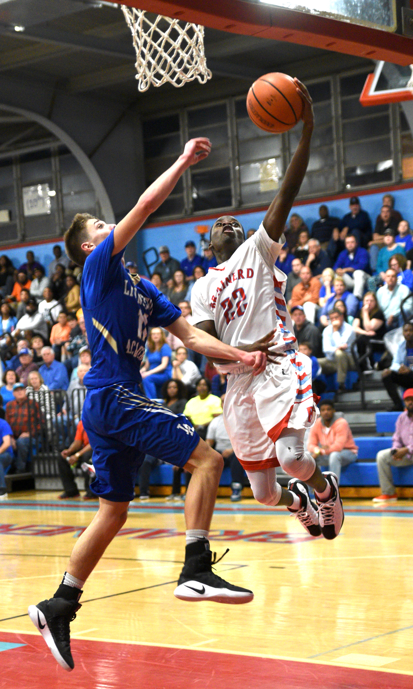 Brainerd's Malik Hampton is guarded by Livingston's Cody Ray Monday, March 6, 2017 at Brainerd High School.