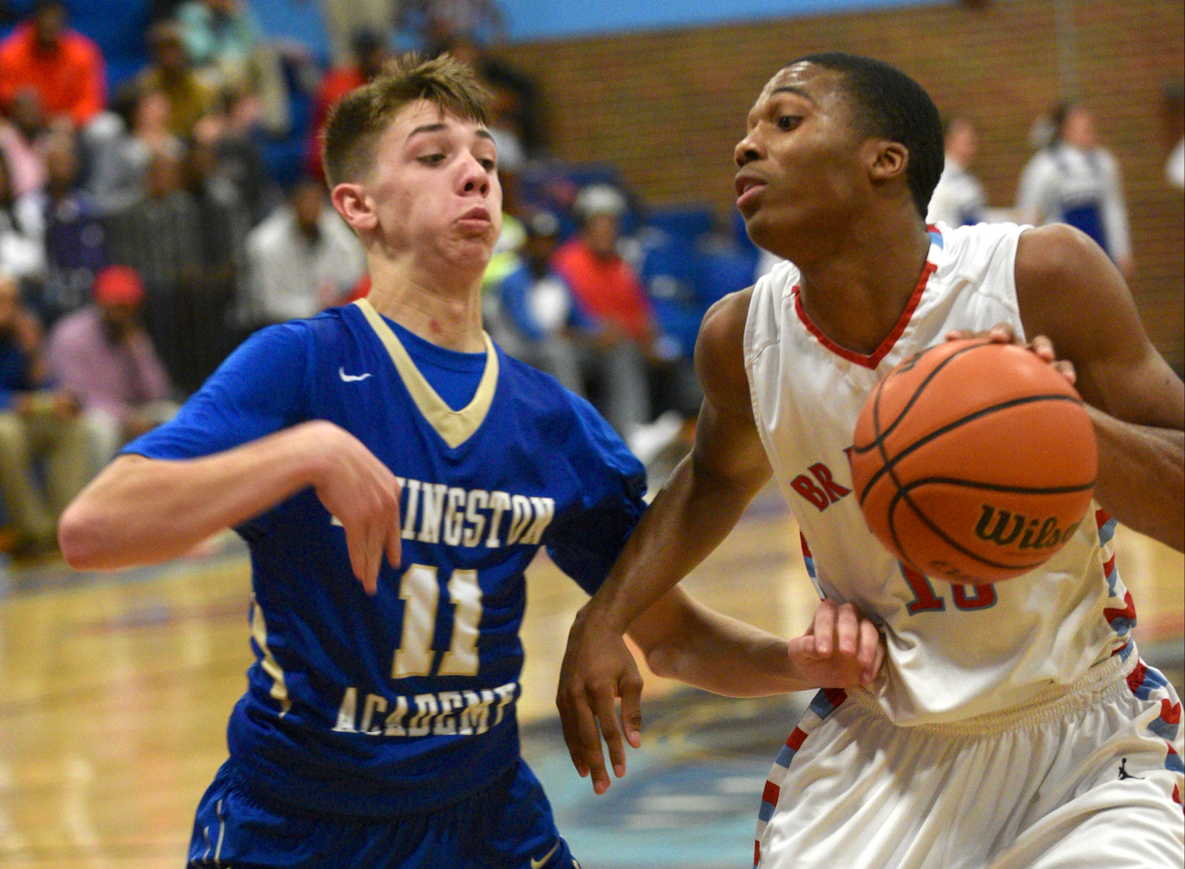 Brainerd's Kentrell Evans is guarded by Livingston's Cody Ray Monday, March 6, 2017 at Brainerd High School.