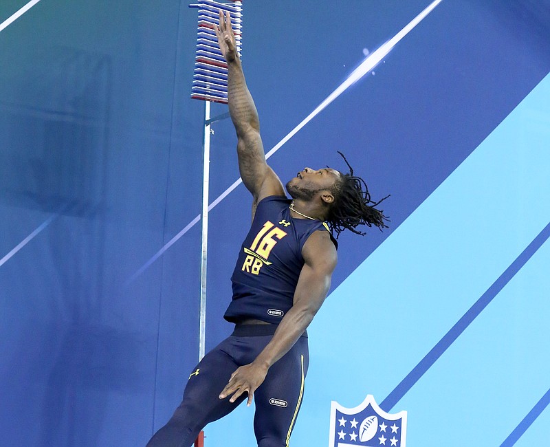 Tennessee running back Alvin Kamara performs in the vertical jump at the 2017 NFL football scouting combine Friday, March 3, 2017, in Indianapolis. (AP Photo/Gregory Payan)