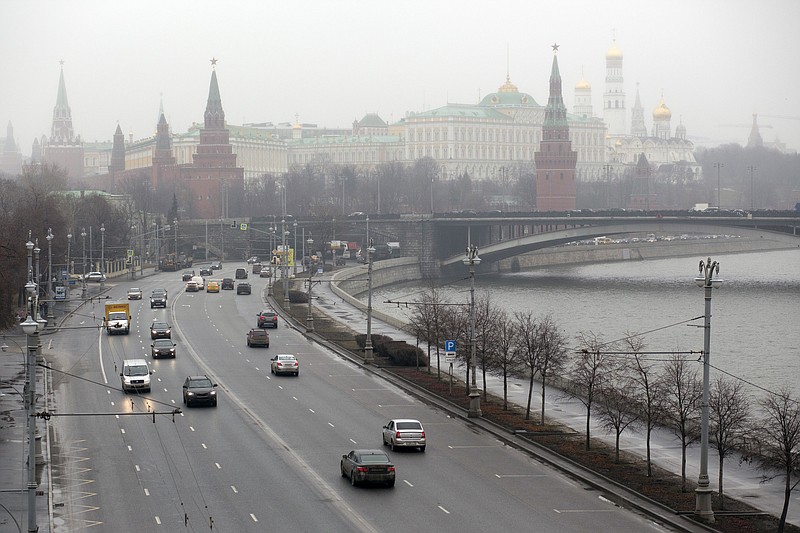 
              The Kremlin is seen through a fog in Moscow, Russia, Monday, March 6, 2017. The spokesman for Russian President Vladimir Putin is distancing himself from President Donald Trump's claims of Barack Obama tapping his phones during the campaign. The claim comes amid the swirl of revelations about contacts between Trump aides and Russia's ambassador to the U.S., both during and after a presidential election Russia is believed to have meddled in.(AP Photo/Alexander Zemlianichenko)
            