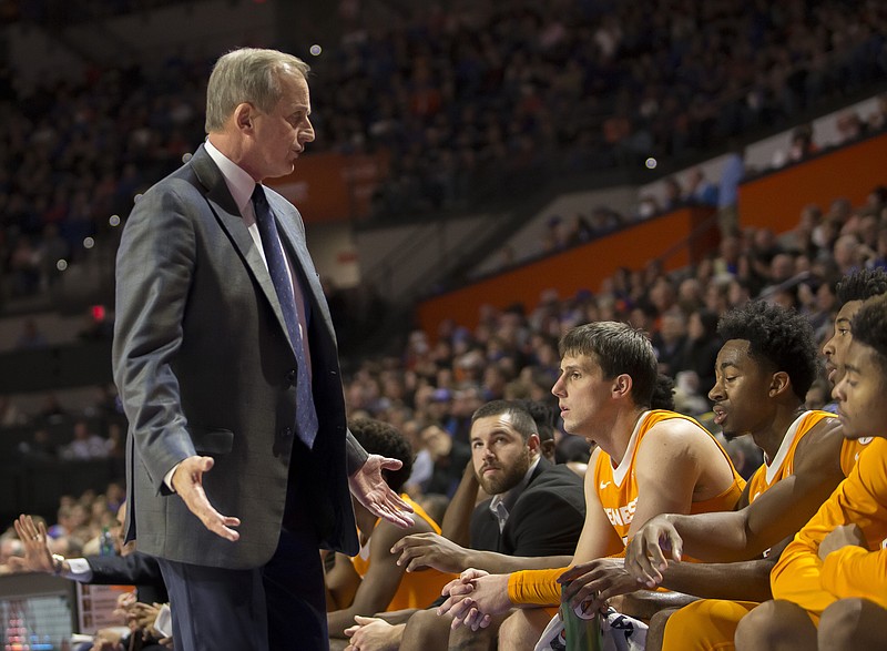 In this Saturday, Jan. 7, 2017, file photo, Tennessee head coach Rick Barnes talks with his bench during the first half of an NCAA college basketball game against Florida in Gainesville, Fla. Tennessee's struggles at protecting double-digit leads are hindering its surprising quest for an NCAA Tournament bid. (AP Photo/Ron Irby, File)