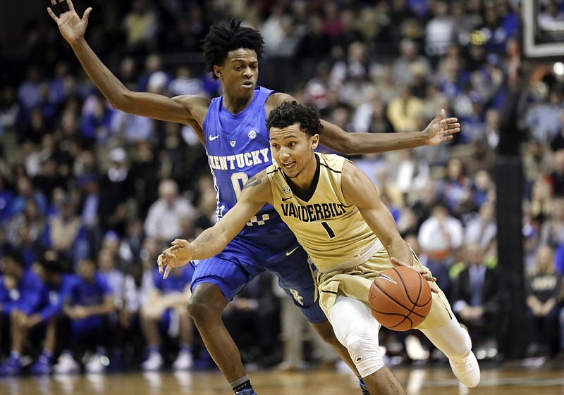 FILE - In this Jan. 10, 2017, file photo, Vanderbilt guard Payton Willis (1) drives against Kentucky guard De'Aaron Fox (0) during the second half of an NCAA college basketball game in Nashville, Tenn. Vanderbilt is the No. 7 seed in the Southeastern Conference tournament, but the Commodores finished the regular season as the SEC’s only team to sweep Florida. (AP Photo/Mark Humphrey, File0