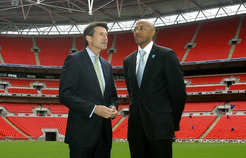 
              FILE - This is a Tuesday, May 20, 2008  file photo of Namibian former athlete Frank Fredericks, right, as he  takes a look on the Wembley Pitch with Sebastian Coe during a visit by the International Olympic Committee to Wembley Stadium in London. The International Olympic Committee members are on a three day visit to London to inspect venues for the London2012 Olympic Games. Former Olympic sprinter Frankie Fredericks has turned himself over to the IOC ethics commission following a French newspaper report Friday March 3, 2017  linking him to a payment from a man who has been banned for life from track and field for corruption.  (AP Photo/Kirsty Wigglesworth, File)
            