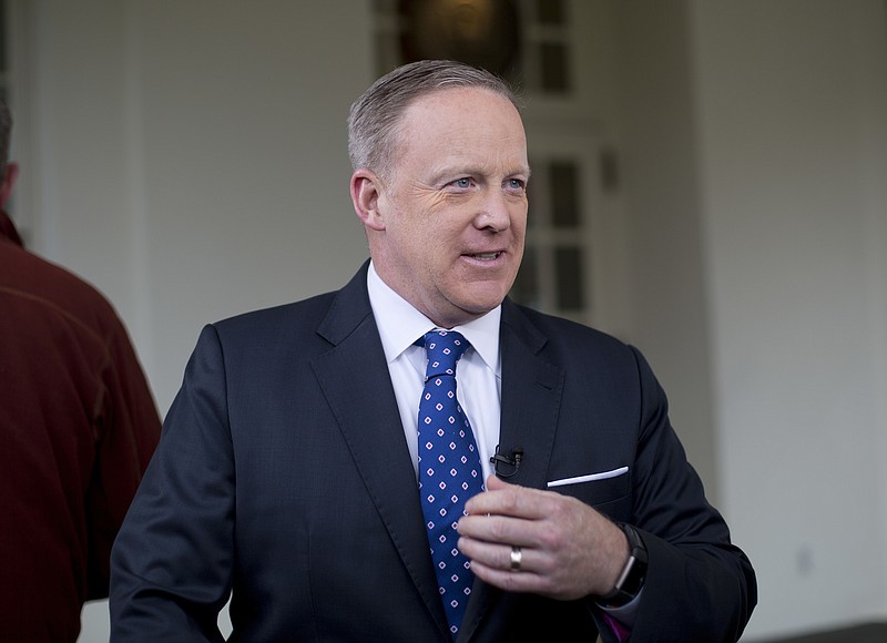 White House Press secretary Sean Spicer walks out of the West Wing of the White House in Washington to speak with members of the media, Monday, March 6, 2017. (AP Photo/Pablo Martinez Monsivais)