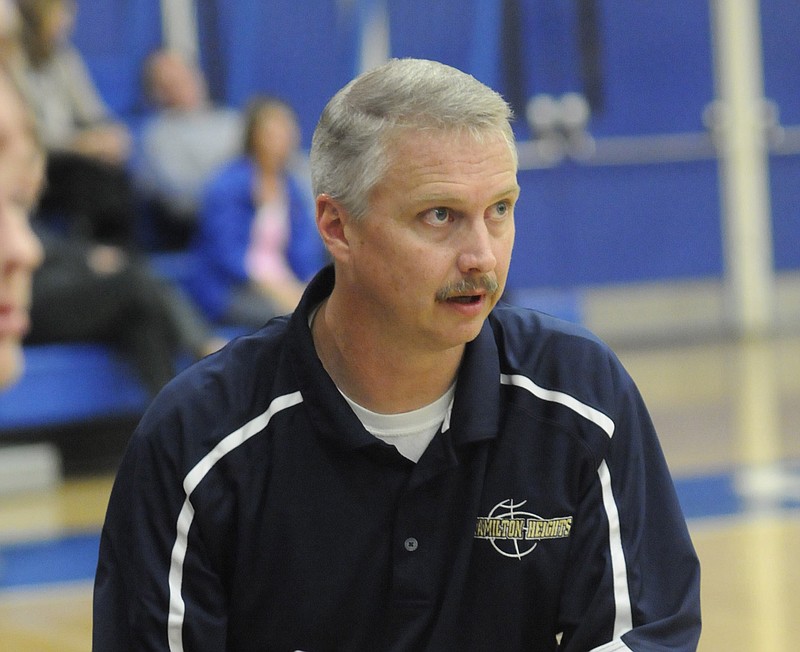 Hamilton Heights basketball coach Bill Eller directs his squad in 2011 at Cleveland.