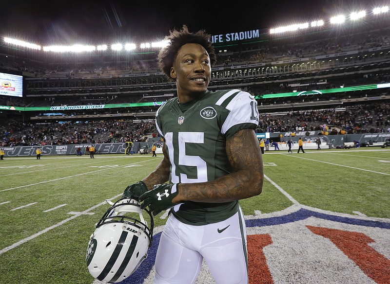 
              FILE - In this Nov. 27, 2016, file photo, New York Jets wide receiver Brandon Marshall walks off the field after the team's NFL football game against the New England Patriots in East Rutherford, N.J. A person with direct knowledge of the team's decision says the Jets are releasing Marshall, clearing $7.5 million on the salary cap. Marshall is the latest big-name player to be cut by the Jets, who have also parted ways with Darrelle Revis, Nick Mangold, Nick Folk and Breno Giacomini this offseason. (AP Photo/Julio Cortez, File)
            