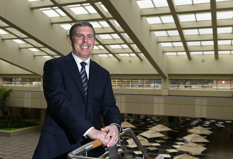 Unum CEO Rick McKenney poses for a portrait Friday, Feb. 3 2017 above Unum's atrium.