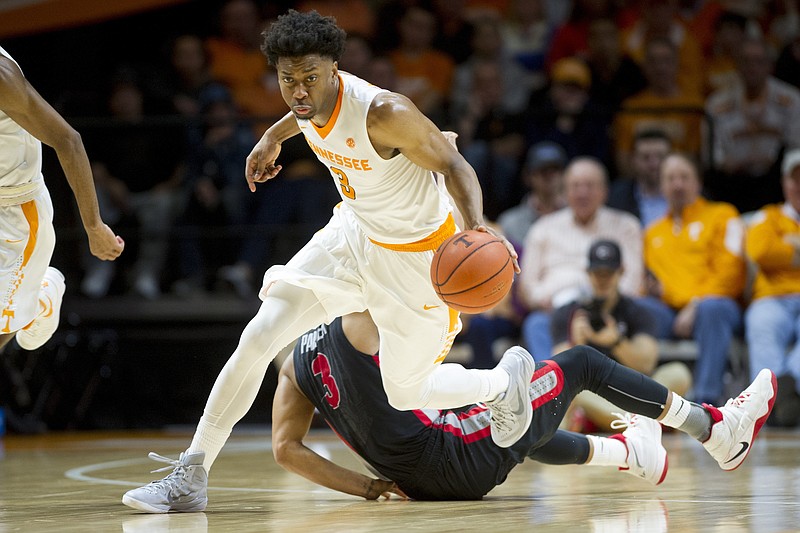 Tennessee's Robert Hubbs III leaves a Georgia player in his wake on Feb. 11. A knee injury kept him from being as effective as usual in Thursday's SEC tournament loss to the Bulldogs that ended his Vols career.