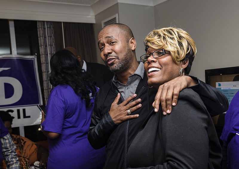 Anthony Byrd, left, talks with his campaign manager Veronica Dunson after receiving news of his victory over incumbent District 8 city councilman Moses Freeman at his election watch party at the Chattanoogan Hotel on Tuesday, March 7, 2017, in Chattanooga, Tenn.