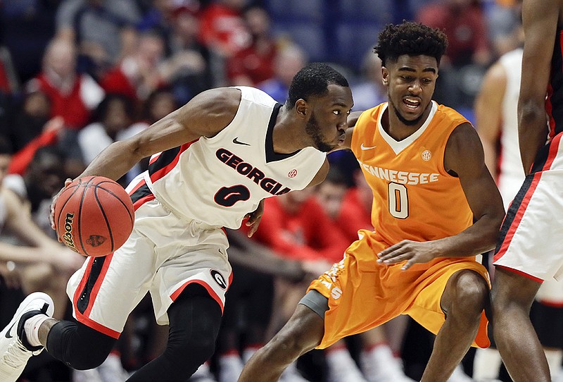 Georgia guard William Jackson II drives past Tennessee's Jordan Bone during their SEC tournament matchup Thursday afternoon at Bridgestone Arena. Bone acknowledges that his defense was deficient in his freshman season.