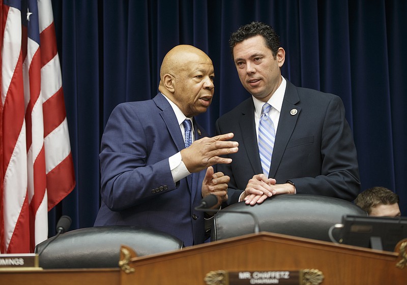 
              FILE - In this July 7, 2016 file photo, House Oversight and Government Reform Committee Chairman Rep. Jason Chaffetz, R-Utah, right, confers with the committee's ranking member Rep. Elijah Cummings, D-Md. on Capitol Hill in Washington. Congressional investigators are demanding documents and contacting witnesses in a wide-ranging probe of the Defense Department’s troubled anti-propaganda efforts against the Islamic State.  (AP Photo/J. Scott Applewhite, File)
            