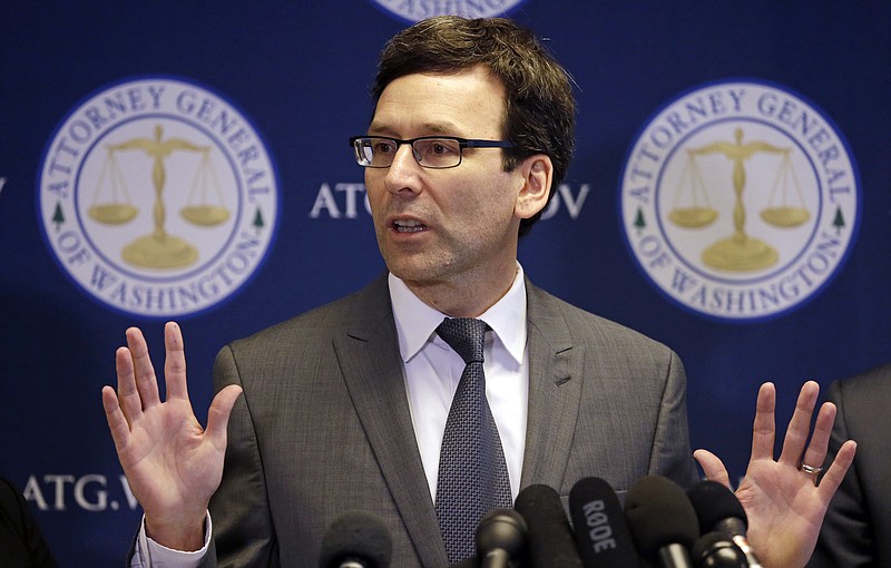 
              Washington State Attorney General Bob Ferguson speaks at a news conference about the state's response to President Trump's revised travel ban Thursday, March 9, 2017, in Seattle. Legal challenges against Trump's revised travel ban mounted Thursday as Washington state said it would renew its request to block the executive order. It came a day after Hawaii launched its own lawsuit, and Ferguson said both Oregon and New York had asked to join his state's legal action. (AP Photo/Elaine Thompson)
            