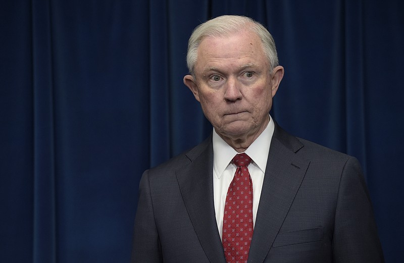 
              FILE - In this March 6, 2017 file photo, Attorney General Jeff Sessions waits to make a statement at the U.S. Customs and Border Protection office in Washington. Sessions is seeking the resignations of 46 United States attorneys who were appointed during the prior presidential administration, the Justice Department said Friday, March 10, 2017. (AP Photo/Susan Walsh, File)
            