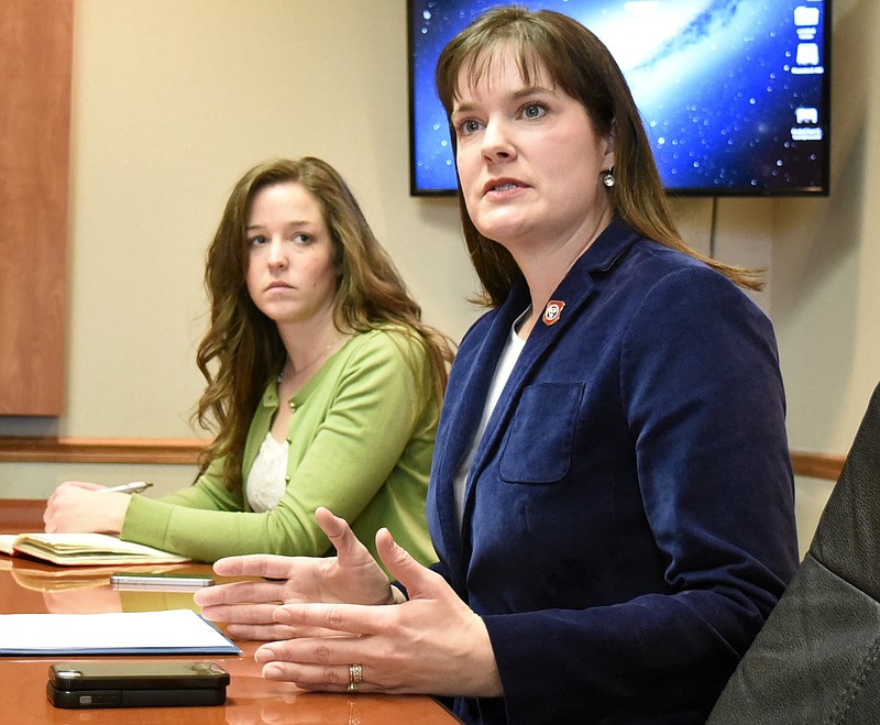 Tennessee commissioner of education Candice McQueen spoke to the editorial board of the Chattanooga Times Free Press at the newspaper's office on March 7, 2017.  Director of strategic communication and chief of staff Sara Gast listens in the background.      