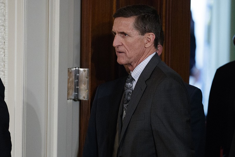 
              FILE - In this Feb. 13, 2017 file photo, Mike Flynn arrives for a news conference in the East Room of the White House in Washington. Flynn, President Donald Trump’s former national security adviser, who was fired from the White House last month, has registered as a foreign agent with the Justice Department for work that may have aided the Turkish government in exchange for $530,000.  (AP Photo/Evan Vucci, File)
            