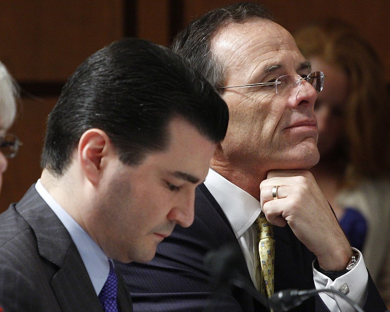 
              FILE - In this June 11, 2009 file photo, Dr. Scott Gottlieb, left, is seen on Capitol Hill in Washington. A White House official says President Donald Trump is choosing Gottlieb, a conservative doctor-turned-pundit with deep ties to Wall Street and the pharmaceutical industry to lead the powerful Food and Drug Administration (FDA).  (AP Photo/Harry Hamburg, File)
            