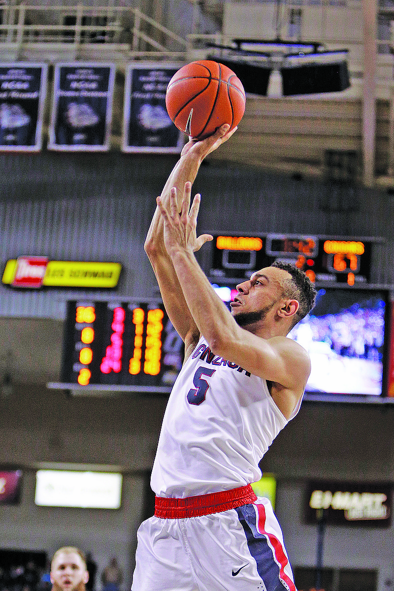 Gonzaga guard Nigel Williams-Goss (5) shoots during the second half of an NCAA college basketball game against BYU in Spokane, Wash., Saturday, Feb. 25, 2017. (AP Photo/Young Kwak)