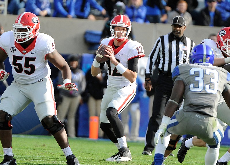 Georgia fifth-year senior quarterback Brice Ramsey, shown here during a 2014 win at Kentucky, will play his final season elsewhere as a graduate transfer.
