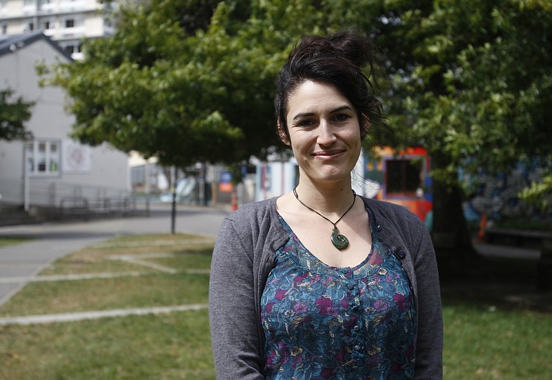 
              In this Wednesday, March 8, 2017, photo, Alanna Irving, who is originally from San Francisco and moved to New Zealand six years ago, poses in Wellington, New Zealand. In New Zealand, the number of Americans who applied for a grant of citizenship rose by 70 percent in the 12 weeks following the election of President Donald Trump when compared to the same period a year earlier, immigration records obtained by The Associated Press show. (AP Photo/Nick Perry)
            
