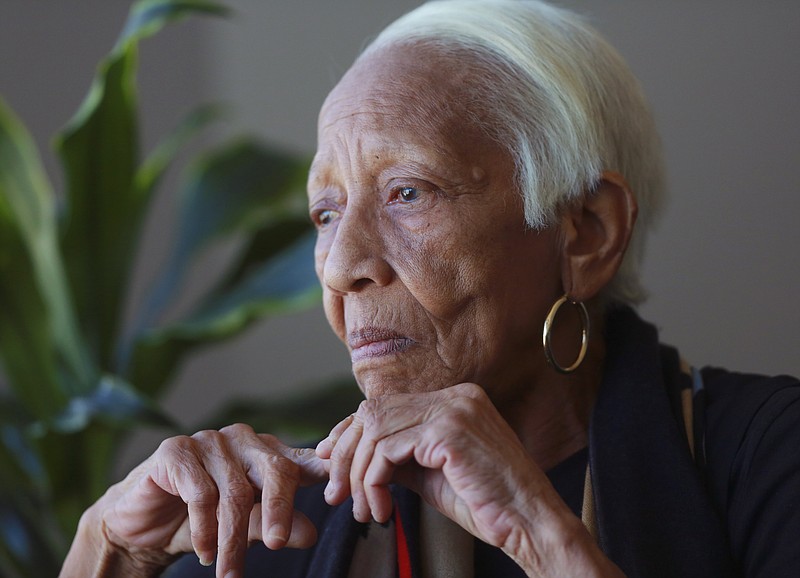 In this Jan. 11, 2016, file photo, Doris Payne speaks during an interview in Atlanta. Payne, a noted jewel thief who discussed her six-decade criminal career in a documentary has been arrested after authorities said she failed to appear in court. The DeKalb County Sheriff's Office says Payne was arrested at her Atlanta home on Monday, March 13, 2017. (AP Photo/John Bazemore, File)