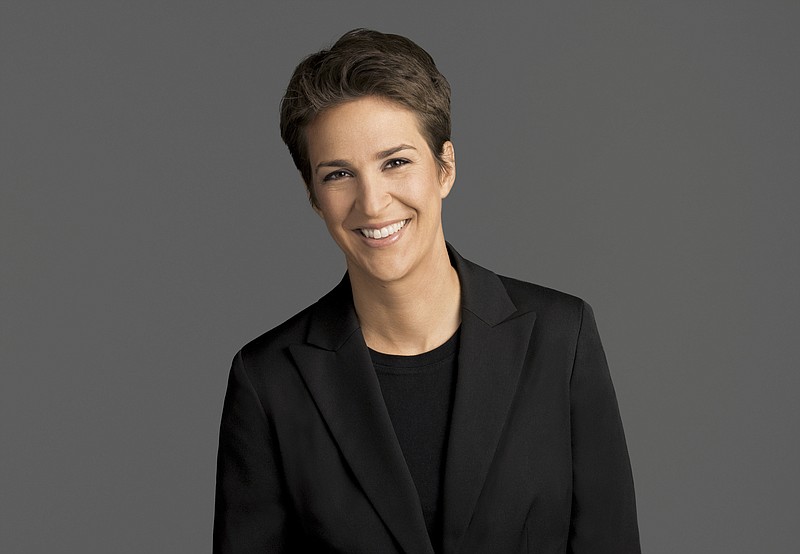 
              This image released by NBC shows Rachel Maddow, host of "The Rachel Maddow Show," on MSNBC. Maddow was at the center of the political media universe Tuesday, March 14, 2017, with a story on President Donald Trump’s tax returns. (MSNBC via AP)
            