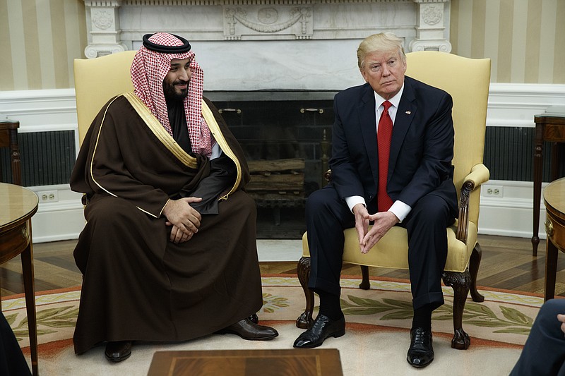 
              President Donald Trump meets with Saudi Defense Minister and Deputy Crown Prince Mohammed bin Salman bin Abdulaziz Al Saud in the Oval Office of the White House in Washington, Tuesday, March 14, 2017. (AP Photo/Evan Vucci)
            