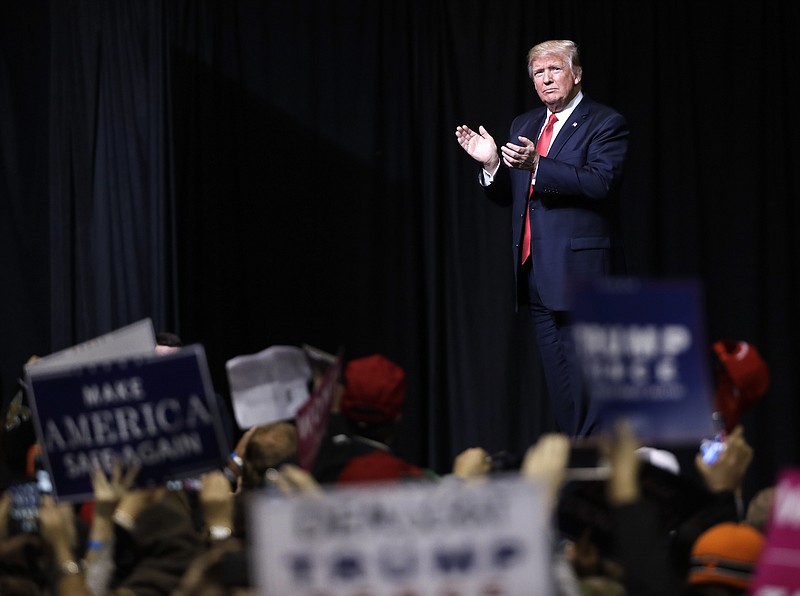 President Donald Trump acknowledges applause as he leaves the stage after speaking at a rally Wednesday, March 15, 2017, in Nashville, Tenn. (AP Photo/Mark Humphrey)

