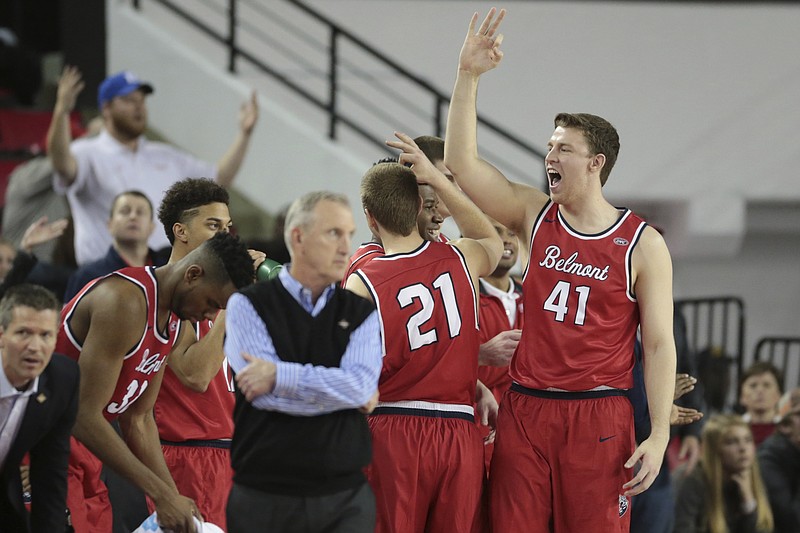 Belmont players react after a score against Georgia in an NCAA college basketball game in the NIT in Athens, Ga., Wednesday, March 15, 2017. Belmont defeated Georgia 78-69. (John Roark/Athens Banner-Herald via AP)

