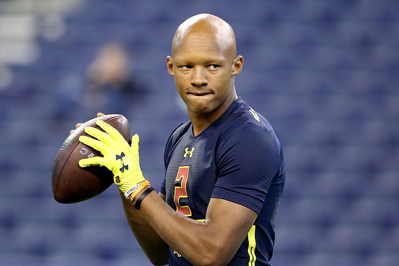 Tennessee quarterback Josh Dobbs is seen in a drill at the 2017 NFL football scouting combine Saturday, March 4, 2017, in Indianapolis. (AP Photo/Gregory Payan)